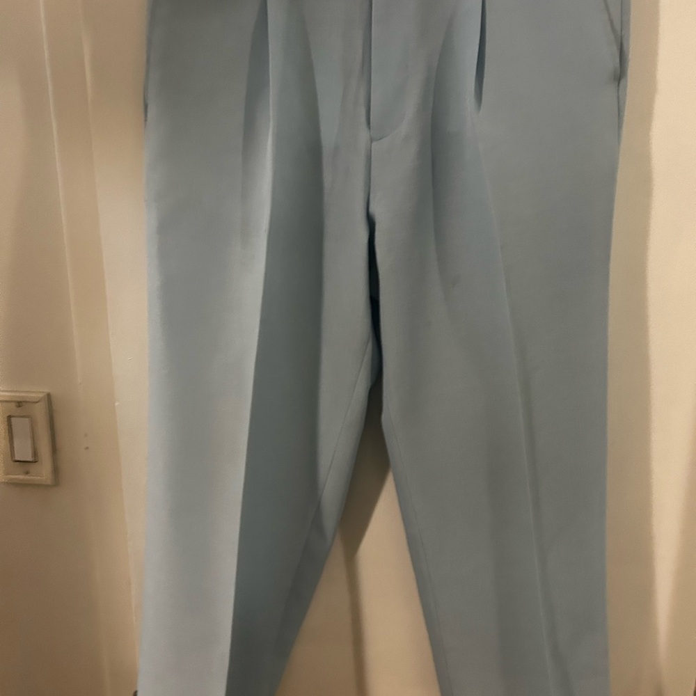 Men used dress pants cuffs at the bottom pant